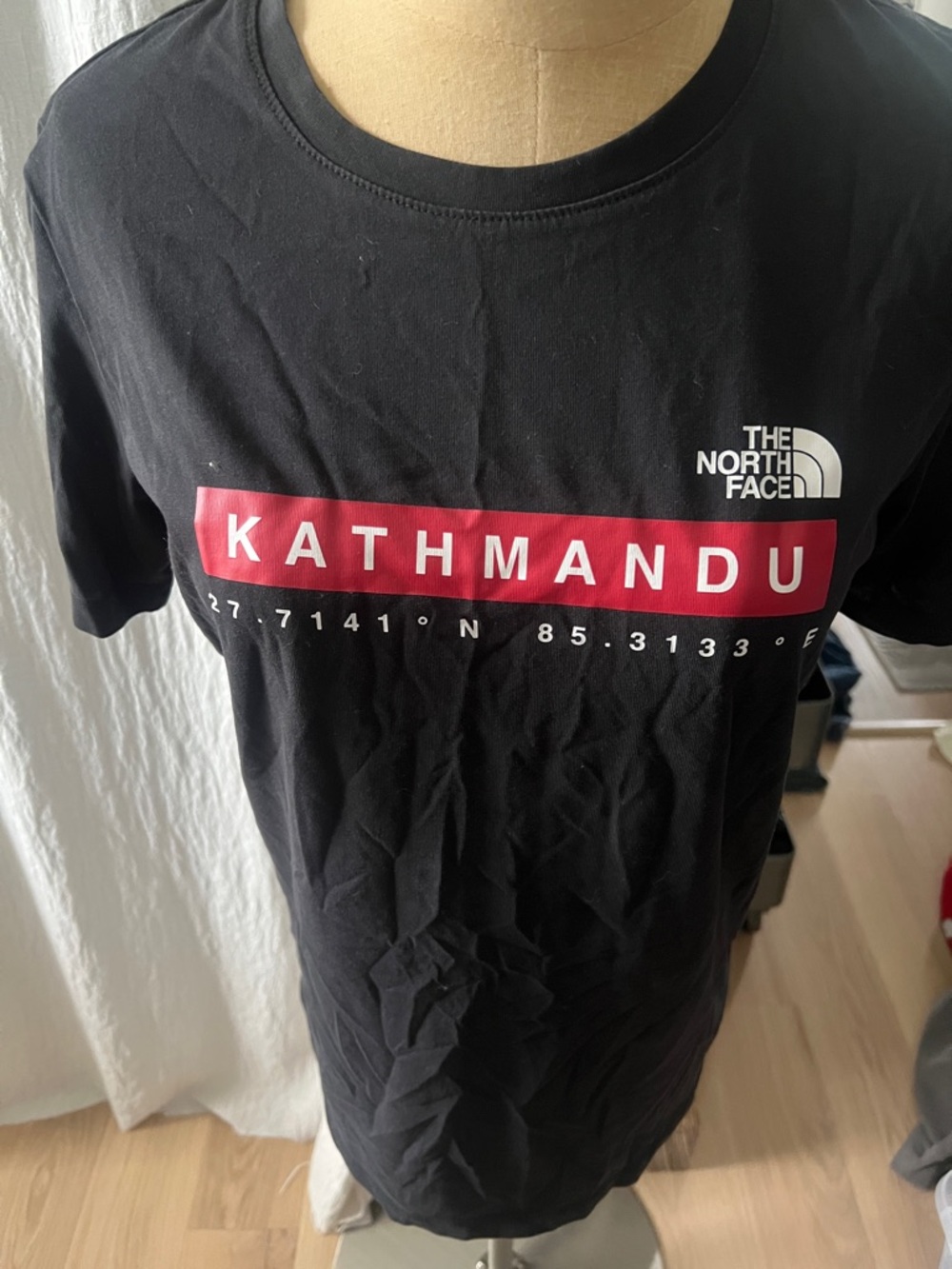 The North Face Black Tee with Red Kathmandu Banner